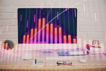 Forex graph hologram on table with computer background. Double exposure. Concept of financial markets.
