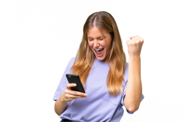 Young beautiful woman over isolated background with phone in victory position