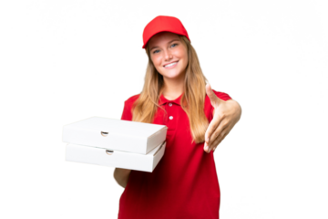 Young caucasian pizza delivery woman with work uniform picking up pizza boxes over isolated background shaking hands for closing a good deal