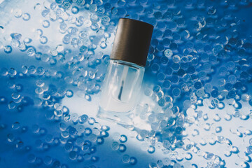 Still life image of a matte top coat bottle for manicure in eleagnt background
