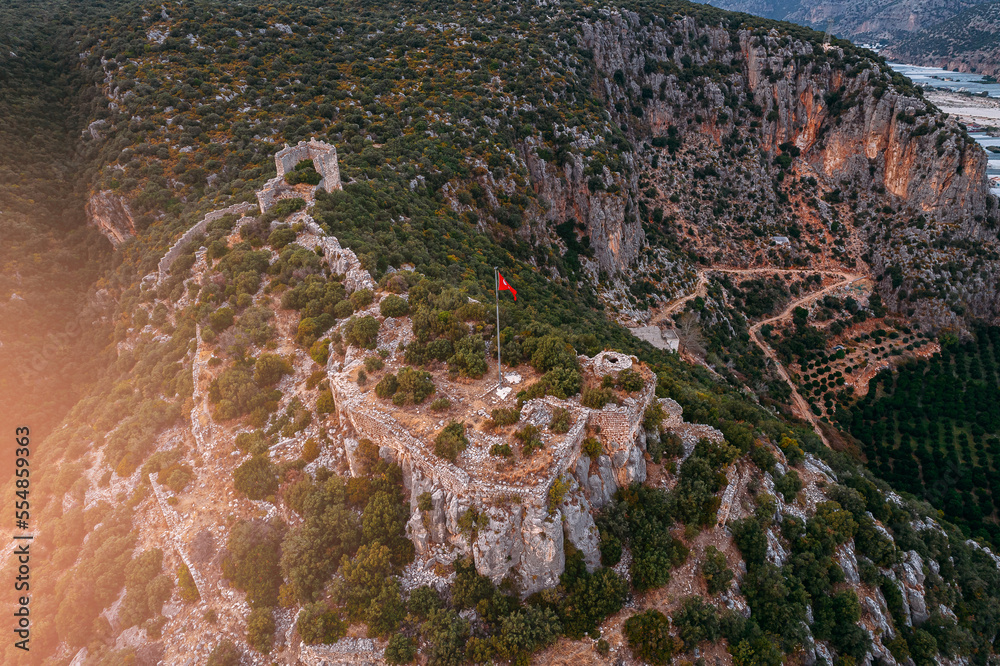 Wall mural Aerial Top view ruins Myra Ancient City in Demre Antalya, Turkey. Old tombs and amphitheater photo by drone - Wall murals