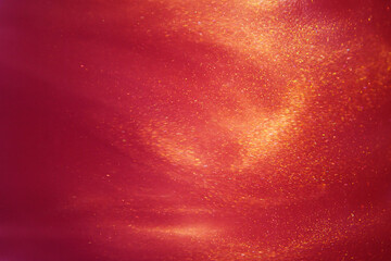 abstract red background with sparkles liquid waves and motion