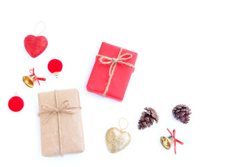 Christmas and New year decorations, Gift boxs, Pine cones, Red and Golden glitter heart, Golden bell and Red decoration christmas ball on white background