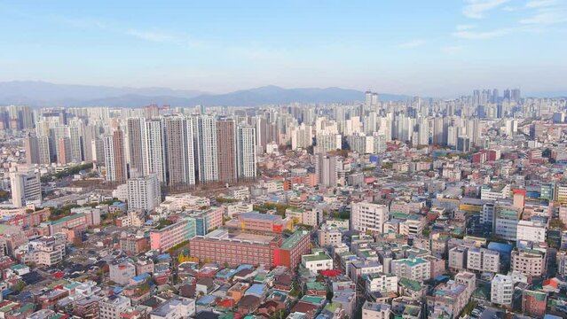 Daegu: Aerial view of Metropolitan City in South Korea in autumn colors, sunny day - landscape panorama of Eastern Asia from above
