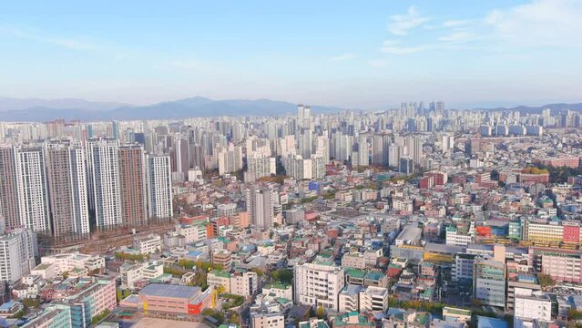 Daegu: Aerial view of Metropolitan City in South Korea in autumn colors, sunny day - landscape panorama of Eastern Asia from above
