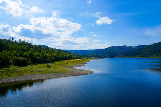 View of the Innerstetalsperre with the surrounding nature. Landscape at the Innerste reservoir. Lake in the Harz.
