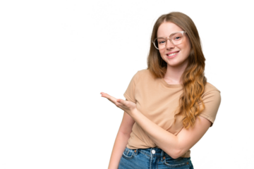 Young pretty woman over isolated background presenting an idea while looking smiling towards