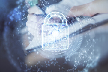 Double exposure of woman's hands writing with lock icon. Concept of security and protection of data