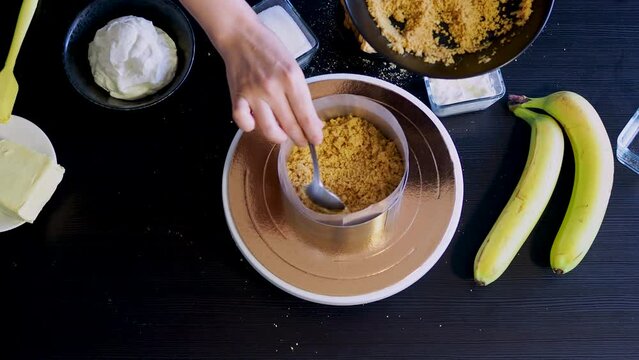 Cooking Banoffi cake at home in the kitchen, pastry recipe.