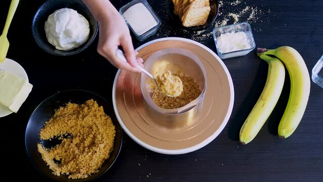 Cooking Banoffi cake at home in the kitchen, pastry recipe.