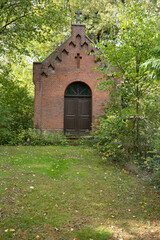 Fototapeta na wymiar old chapel in the woods