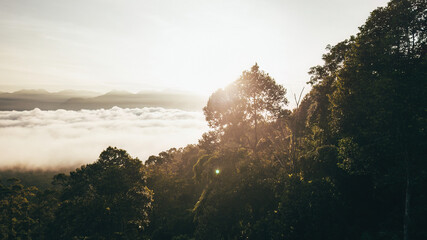 Sea clouds during golden sunrise above the Titiwangsa range mountains in Lenggong, Perak.