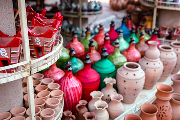 Omani Souvenirs. Hand Made Pottery in Nizwa Market. Clay Jars at the Rural Traditional Arabic Bazaar, Oman. Arabian Peninsula. 