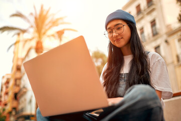 Asian female tourist student on city streets