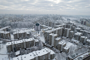 Aerial winter snowy day view of frozen Pasilaiciai district, Vilnius, Lithuania