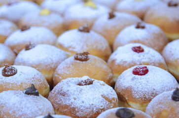 Sufganiyot - Israeli Donuts. Selective focus. Symbol of sweet Hanukkah donut - Sufganiyah. 