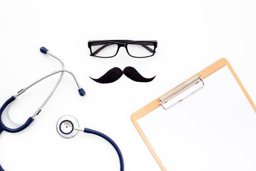 Glasses with a mustache and doctor clipboard. Male medical checkup concept