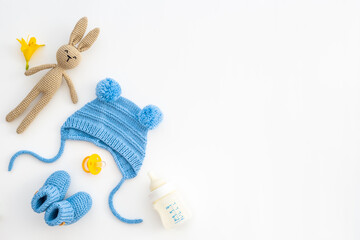Baby boy blue hat with booties and accessories, top view