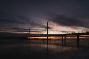 Cable-stayed bridge in the evening at sunset