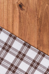 wood table with checkered cloth