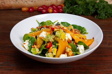 Superfood Salad cheese cube, leaves, greens, cherry served in dish isolated on table top view of arabian food