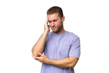 Young handsome caucasian man isolated on green chroma background with headache