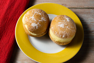 Sweet Bread with Boston cream and sugar, Brazilian donut called "bakery dream", or berlin ball.