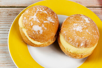 Sweet Bread with Boston cream and sugar, Brazilian donut called "bakery dream", or berlin ball.