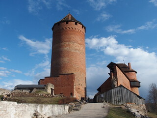 Round tower and restored part of Turaida Castle near Sigulda, Latvia