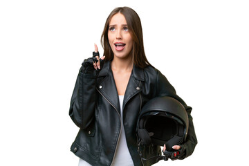 Young pretty caucasian woman with a motorcycle helmet over isolated background thinking an idea...