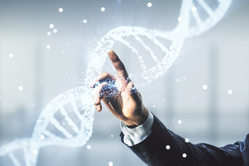 Double exposure of male hand presses on creative DNA hologram on blurred interior background. Bio...