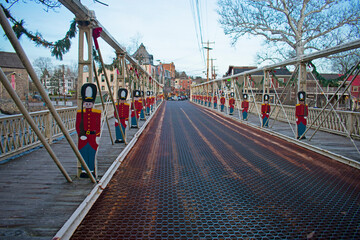 Fototapeta na wymiar Main Street Historic Bridge at Clinton, New Jersey, decorated with cardboard soldiers at Christmas holiday season -01