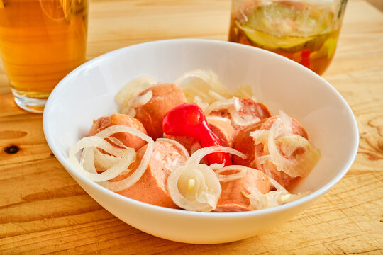 Tasty czech sausage utopenec with beer