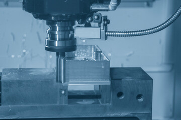 The CNC milling machine rough cutting the injection mold parts by solid flat endmill tools.