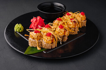 Baked sushi with cheese and sesame seeds