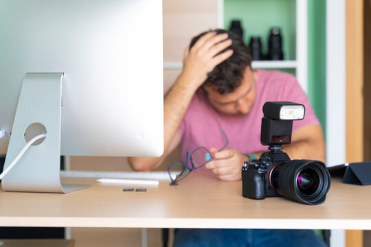 Man In His Office Worried About His Photos On The Computer