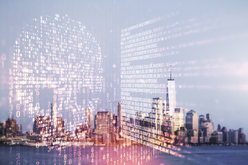 Double exposure of abstract virtual creative code skull hologram on New York city skyscrapers background. Malware and cyber crime concept