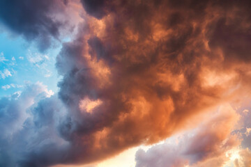 Beautiful dramatic storm clouds in the sunset sky