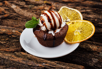 Chocolate fondant cake, molten lava cake with lemon slices