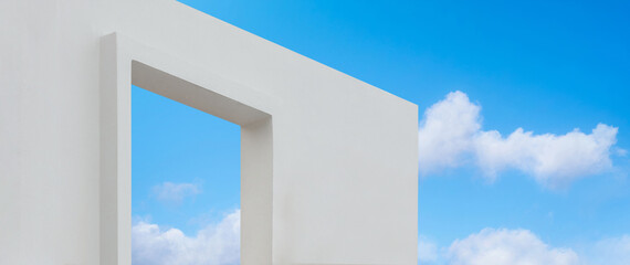 Wall concrete texture with open window against blue sky and clouds, A part of White paint cement building, Ant view Modern architecture with open door in Spring or Summer sky, Minimalistic design