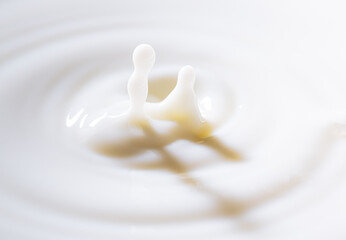 Macro milk drop texture,milk or white liquid splash with circle ripple