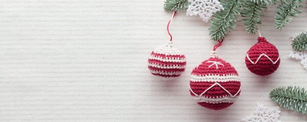 Beautiful cute crocheted christmas balls for decoration Horizontal Banner with copyspace