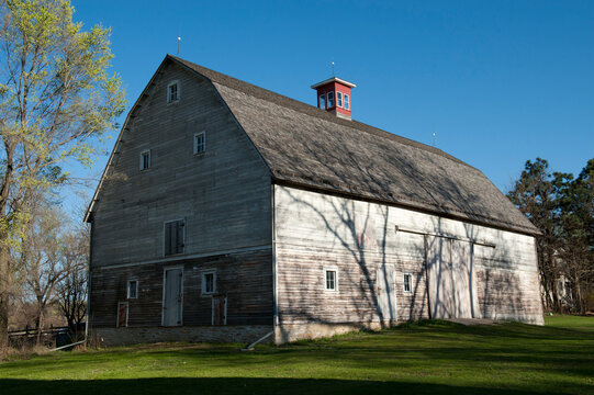 Old weathered barn on a bright, sunny day; Walton, Nebraska, United States of America