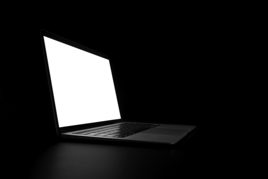 modern laptop computer on the tabl on the black background