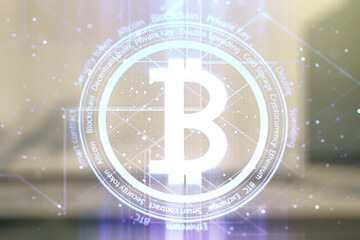 Obraz premium Double exposure of creative Bitcoin symbol hologram on modern business center exterior background. Cryptocurrency concept