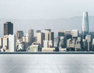 Obraz premium Empty concrete rooftop on the background of a beautiful San Francisco city skyline at daytime, mockup