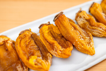Dried persimmon on the plate