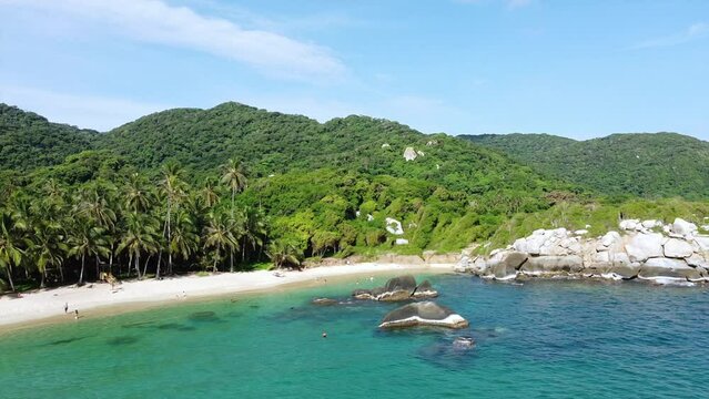 Santa Marta Colombia , Tayrona Natural Park Caribbean sea Cabo San Juan  - Drone aerial view of amazing  sand beach and  forest - Tourist attraction for relax and enjoy the paradise of the ocean sea 