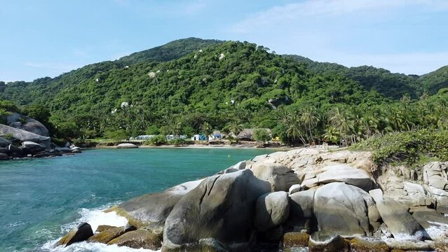 Santa Marta Colombia , Tayrona Natural Park Caribbean sea Cabo San Juan  - Drone aerial view of amazing  sand beach and  forest - Tourist attraction for relax and enjoy the paradise of the ocean sea 