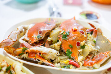 Fry crab with green onion and sauce in Taiwanese food store